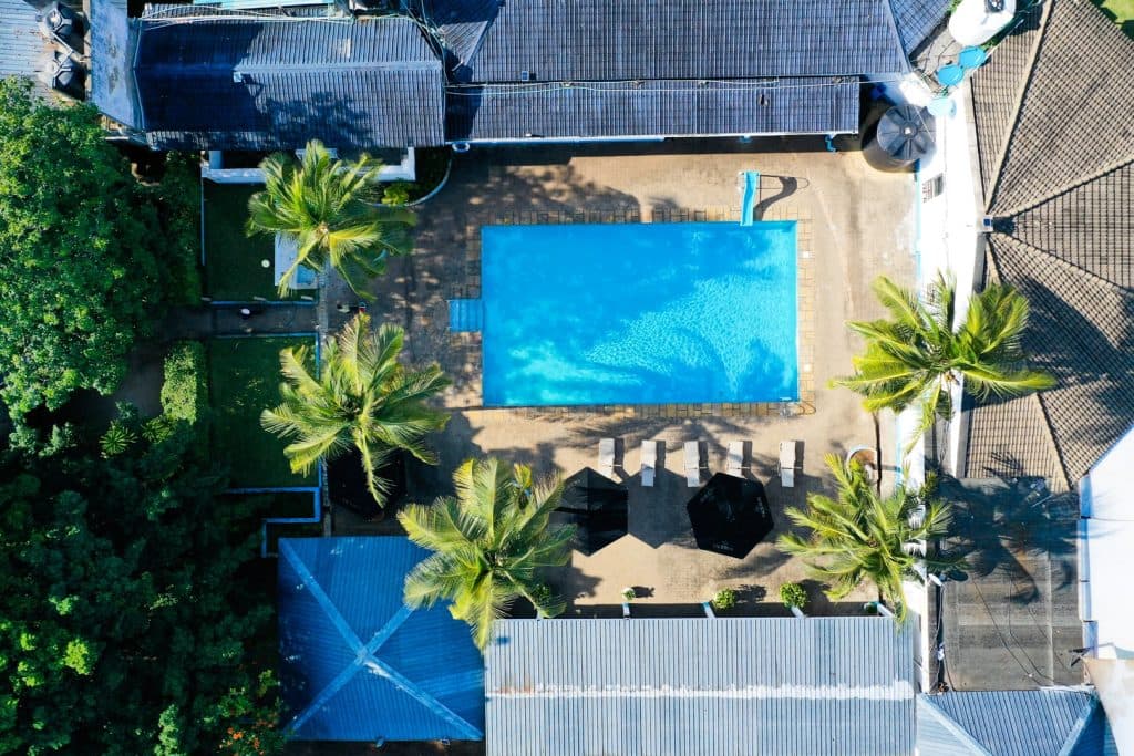 Pool, clubhouse, and course from above